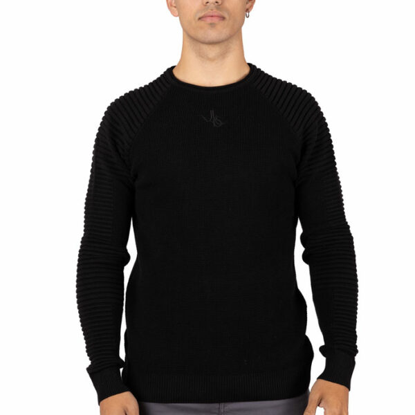Jersey cuello caja con mangas armadas y textura en relieve negro