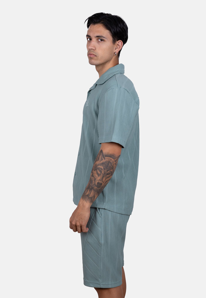 Conjunto oversize de camisa y bermuda en punto granulado verde - Image 4