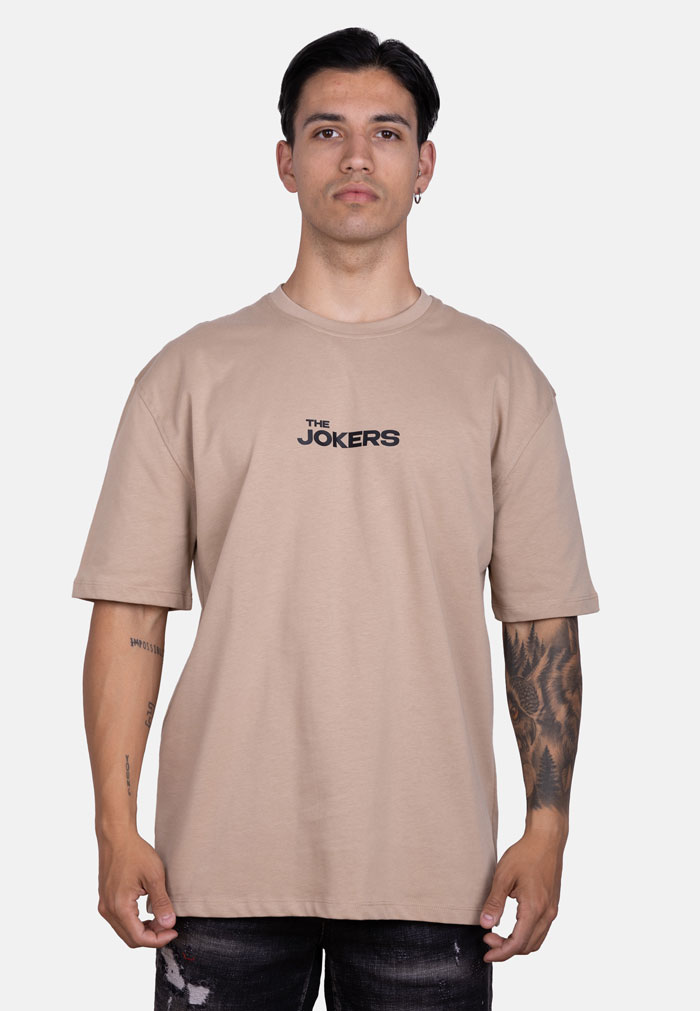 Camiseta oversize beige100% algodón con estampado The Jokers